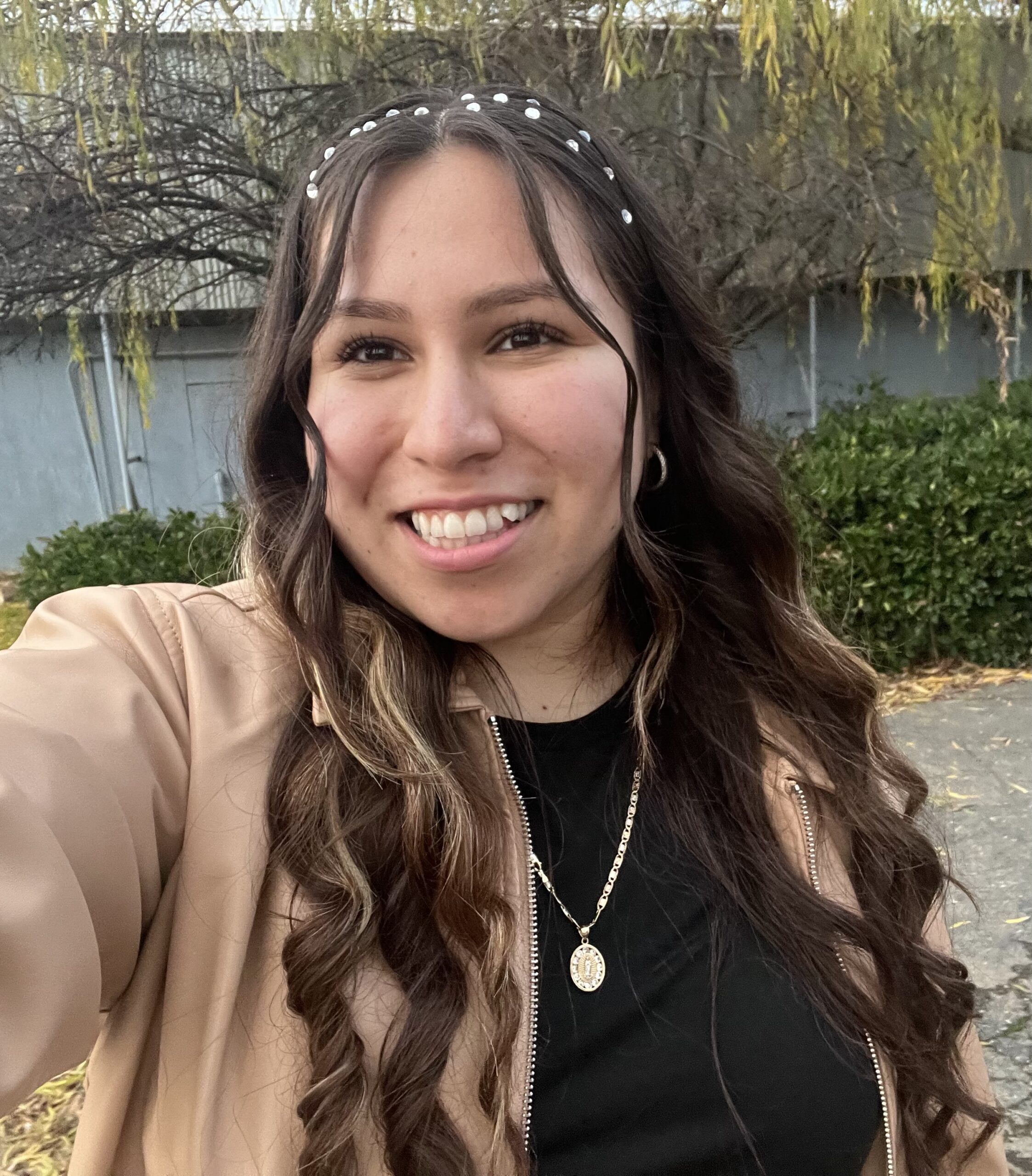 Portrait of Alondra Duran smiling outdoors